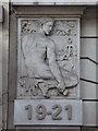 Bas relief panel on 19-21 Hatton Garden, EC1