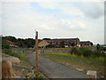 Houses on River Court, viewed from the path leading from the Rainham Marshes Nature Reserve Information Centre