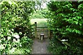 The Stile on the footpath which leads across a field between Easewell Farm and Yarde Farm