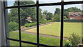 SK9924 : Bowling green seen from within the Willoughby Gallery by Bob Harvey