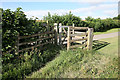 Gate leading from footpath onto track