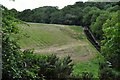 Slade Reservoir where the water leaving the pool cascades down concrete steps and becomes the West Wilder Brook