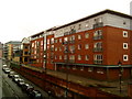 Apartment building on Gas Street, above Holliday Street