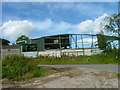 Snow damaged farm building