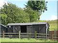 Old railway goods van near the Milecastle Inn