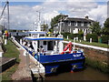 SX9686 : The Sea Ferret enters Turf Lock, on the Exeter Ship Canal by Roger Cornfoot