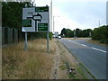 Road sign on the approach to Rush Green Roundabout