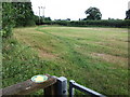 Small field and footpath marker near Redfern Manor