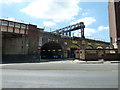 Looking across Lambeth Road towards the railway bridge