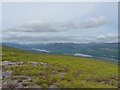 NN0774 : Looking down hillside, Loch Eil beyond by Phillip Williams