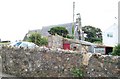 Eglwys St Cwyfan, Tudweiliog, viewed across a garden shed