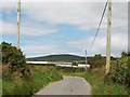 Farm buildings at Ty Mawr Capel Farm viewed across the B4413