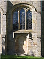 NY7863 : St. Cuthbert's Church, Beltingham - blocked-up door by Mike Quinn