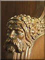 NY7863 : St. Cuthbert's Church, Beltingham - carved head on choir stall (2) by Mike Quinn