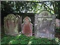 NY7863 : St. Cuthbert's Church, Beltingham - gravestones by Mike Quinn