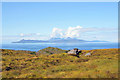 NM6576 : View across the moorland to Eigg and Rum by Steven Brown