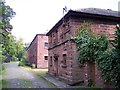 Sandstone cottage at start of path to Rainhill