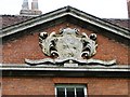 Crest beneath the pediment of The Deanery