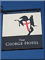 TQ7736 : The George Hotel sign by Oast House Archive