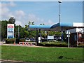 SP3076 : Tesco petrol station, Cannon Park shopping centre by John Brightley