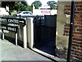 Street signs and benchmark on #1 Lake Street