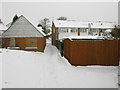 Snow covered footpath to the High Street