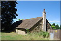 Stone barn by the footpath to St Margaret Church