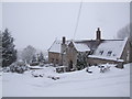 Ty Uchaf Farmhouse in the snow