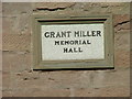 Plaque on the wall of the Grant Miller Memorial Hall