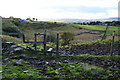 Stile and muddy path near Birchinley Farm