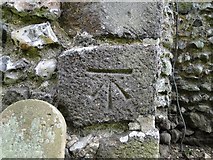 TG0010 : Bench mark on Yaxham St Peter’s church by Adrian S Pye