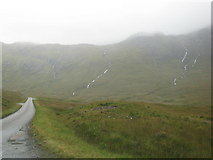 NM5929 : A wet A849 up Glen More by Sarah Charlesworth