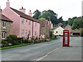 Pink house, red phone box