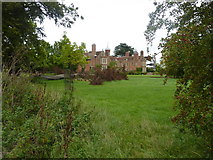 TL8647 : Kentwell Hall, grounds and fallen tree by Peter Barr