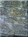 Benchmark on wall of St Andrew