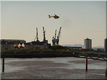 NS5665 : Glasgow: helicopter above the Clyde by Chris Downer