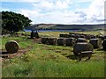 Tractor moving bales