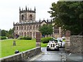 NX9928 : Wedding cars leaving St. Michael's Church by Rose and Trev Clough