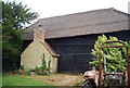 TQ0741 : Stone Chimney on a Wooden Barn, Rapsley Farm by N Chadwick
