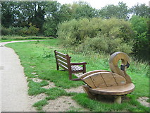 TQ6960 : Swan bench and normal bench, Leybourne Lakes by David Anstiss