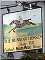 The Running Horses sign