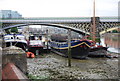 Boats by the eastern span of Battersea Railway Bridge