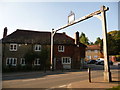 Fittleworth: millennium arch and Swan pub sign