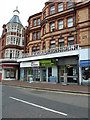 SZ0991 : Estate agents in Old Christchurch Road by Basher Eyre