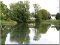 View across the village pond on the green in Wickham Skeith