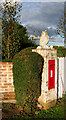 TM4280 : Victorian postbox set into a garden wall, Westhall by Evelyn Simak