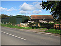 Farm buildings beside the B1140 road to South Walsham