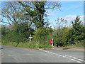 Letterbox by a road junction in Oldways End