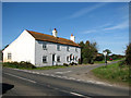 Cottages on the corner of Brake Lane and the B1105 road