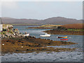 NF9168 : Small boats in Loch Maddy by Rob Burke
